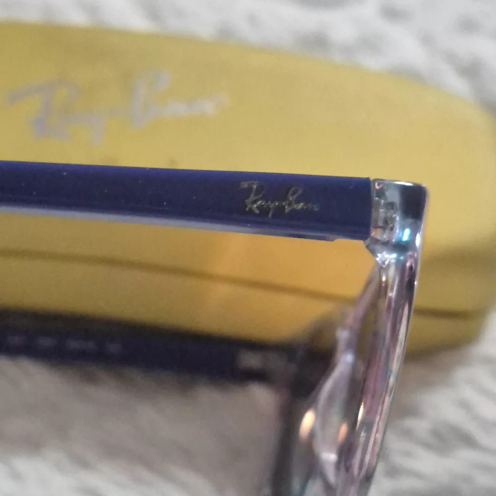 Ray-Ban Transparent Blue Sunglasses with Vibrant Case